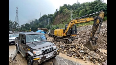 Road clearance work underway on the Jammu-Srinagar highway in Nagrota near Jammu on Sunday. (PTI)