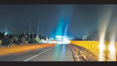 The six-lane road has three lanes on each carriageway, with around 400 central lighting poles on the stretch. (HT File) The six-lane road has three lanes on each carriageway, with around 400 central lighting poles on the stretch. (HT File)
