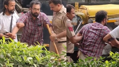 The CPM shared a video of visibly distressed John Brittas being helped by two people to walk to an autorickshaw (@cpimspeak) The CPM shared a video of visibly distressed John Brittas being helped by two people to walk to an autorickshaw (@cpimspeak)