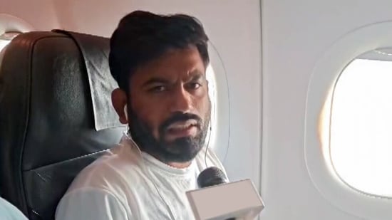 Cockroach Janta Party (CJP) Founder Abhijeet Dipke detain by the Police after the flight landed at IGI Airport, in New Delhi on Saturday. (ANI Video Grab)