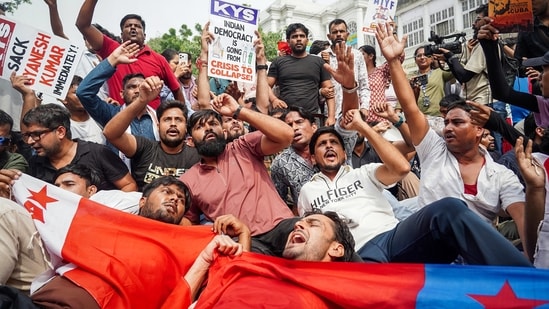 Protesters during the protest against Chief Election Commissioner Gyanesh Kumar at Palika Bazar, Connaught Place, in New Delhi on Sunday.