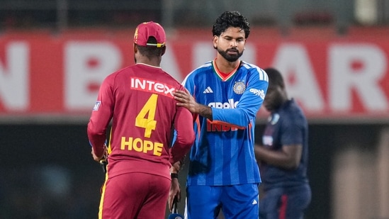 India's captain Shreyas Iyer, right, and West Indies' captain Shai Hope at toss during the second T20I cricket match of a series between India and West Indies, in Ranchi