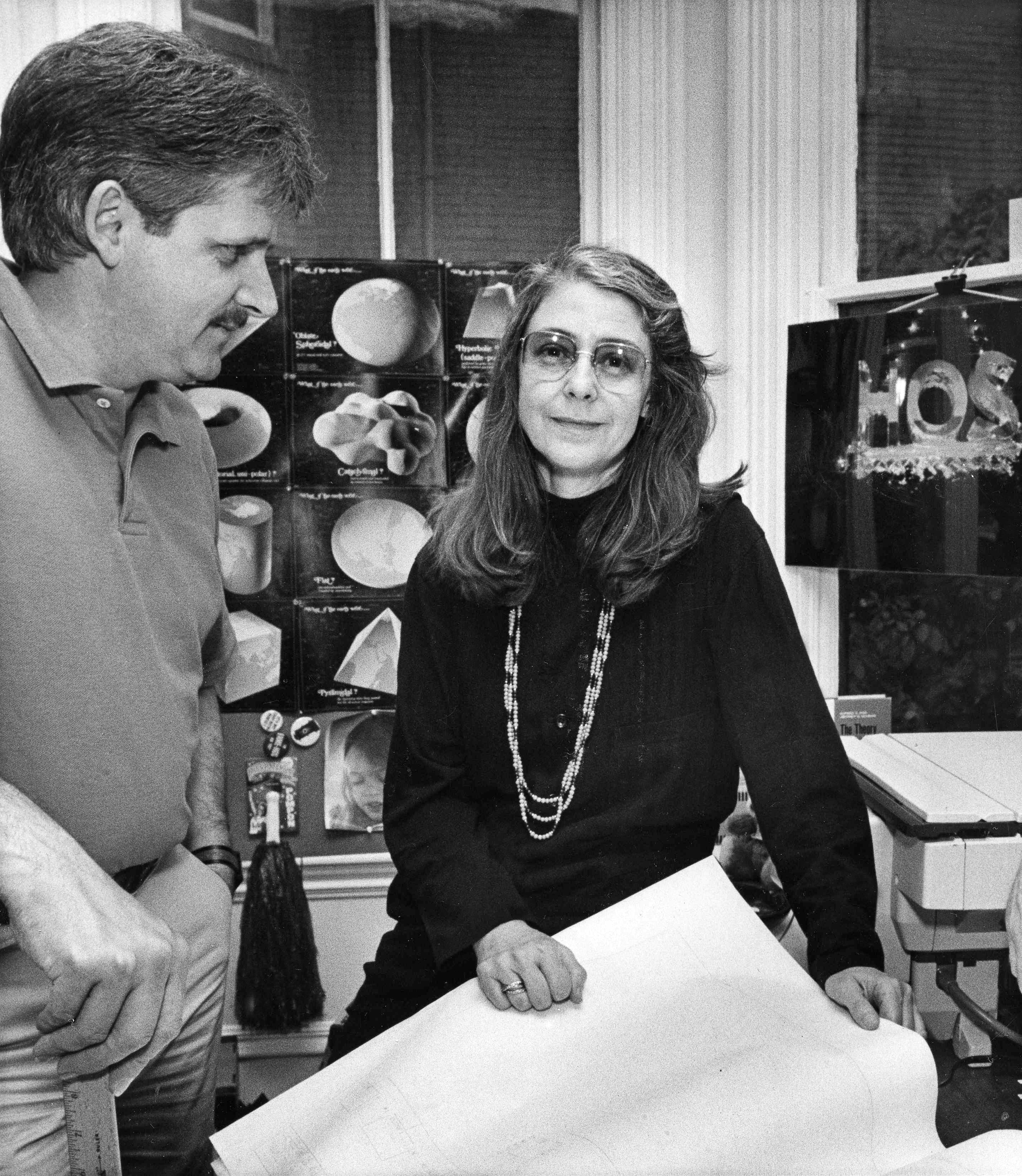 FILE - Margaret Hamilton, chief executive officer of Hamilton Technologies, Inc., poses in her Cambridge, Mass., home and office, Sept. 17, 1986, with company vice president John Schickling. Hamilton directed on-board software development for Apollo missions. (AP Photo/Carol Francavilla, File) (AP Photo/Carol Francavilla) FILE - Margaret Hamilton, chief executive officer of Hamilton Technologies, Inc., poses in her Cambridge, Mass., home and office, Sept. 17, 1986, with company vice president John Schickling. Hamilton directed on-board software development for Apollo missions. (AP Photo/Carol Francavilla, File) (AP Photo/Carol Francavilla)