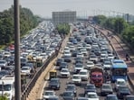 Traffic crawls on the NH-24 near Akshardham following a traffic diversion advisory by Delhi Traffic Police, in New Delhi on Wednesday