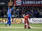India's Axar Patel celebrates the wicket of West Indies' Rovman Powell during the 3rd T20I at Holkar Stadium, in Indore on Sunday(Rahul Singh)