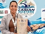 Abhipsha Thakur after clinching top spots at the Asian masters swimming championship in Bengaluru. (HT)