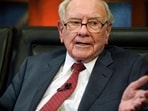 Warren Buffett's S&P 500 ETF strategy amid rising AI stock valuations and stock market bubble fears.  (AP Photo/Nati Harnik, File)
