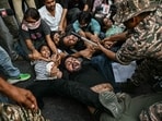 Security personnel detain demonstrators during a protest demanding the resignation of India's Chief Election Commissioner Gyanesh Kumar over alleged voter roll irregularities linked to the "special intensive revision" (SIR), near Jantar Mantar in New Delhi 