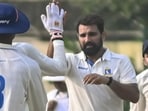 Mohammed Shami celebrates a wicket with his Bengal teammates on Day 1 of the Ranji Trophy tie against Delhi in Kalyani on Sunday. (PTI)