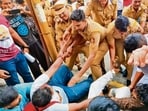 The protesters began gathering at around 4.30 pm and were detained in police vans and taken to Shivajinagar police station. (HT PHOTO)