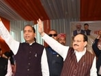 Union minister for health and family welfare and chemicals and fertilizers JP Nadda (right) with former Himachal CM Jai Ram Thakur at an event in Kullu on Sunday. (Aqil Khan/HT)