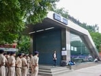 Security personnel stand guard near Janpath Metro Station. 