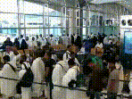 Surveillance footage shows people reacting amid smoke at the moment of an attack at King Khalid International Airport in Riyadh, Saudi Arabia.
