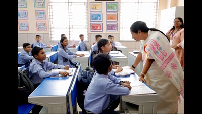 Delhi chief minister Rekha Gupta interacts with schoolchildren during the inauguration of various projects for students on Monday. (ANI)
