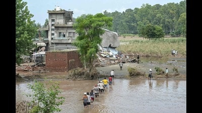 The urgency is underscored by the devastating floods of August and September 2025, when exceptionally heavy rainfall, overflowing rivers and breached embankments inundated hundreds of villages and thousands of acres of farmland across Punjab. (AFP File) The urgency is underscored by the devastating floods of August and September 2025, when exceptionally heavy rainfall, overflowing rivers and breached embankments inundated hundreds of villages and thousands of acres of farmland across Punjab. (AFP File)
