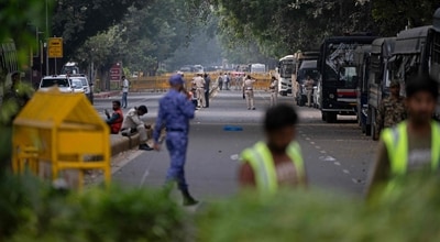 Security personnel are seen at a blocked road amid ongoing protests demanding the resignation of Chief Election Commissioner Gyanesh Kumar near Jantar Mantar on October 11 (AFP) Security personnel are seen at a blocked road amid ongoing protests demanding the resignation of Chief Election Commissioner Gyanesh Kumar near Jantar Mantar on October 11 (AFP)