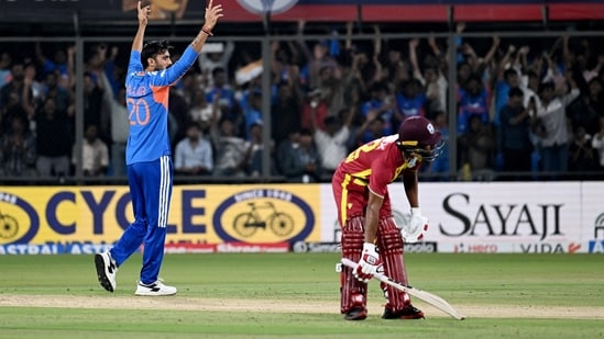 India's Axar Patel celebrates the wicket of West Indies' Rovman Powell during the 3rd T20I at Holkar Stadium, in Indore on Sunday
