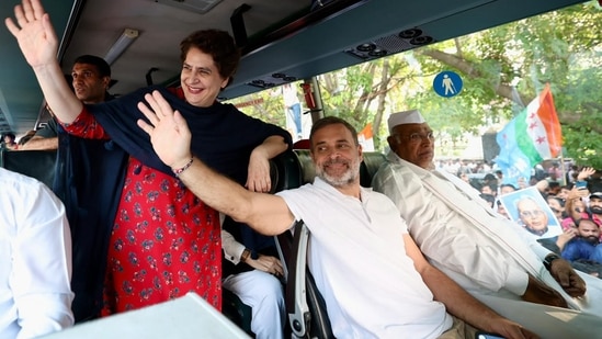 Congress President Mallikarjun Kharge, party leader Rahul Gandhi and other members of the INDIA bloc move in a bus towards the Supreme Court to file a petition against Special Intensive Revision (SIR) of electoral rolls and alleged poll irregularities, in New Delhi.