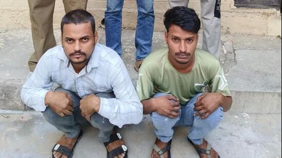 The two suspects in police custody on Monday. (HT Photo)