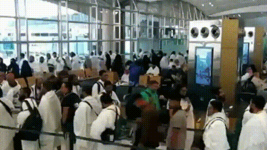 Surveillance footage shows people reacting amid smoke at the moment of an attack at King Khalid International Airport in Riyadh, Saudi Arabia.