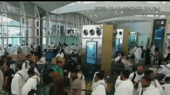 Surveillance footage shows people reacting amid smoke at the moment of an attack at King Khalid International Airport in Riyadh, Saudi Arabia.