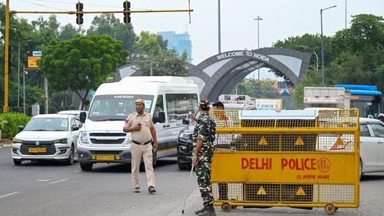 Police personnel, including officials from the BSF, Delhi Police and Noida Police, have been deployed at the Noida–Delhi Chilla Border in New Delhi, India, on Sunday, October 11, 2026. Police personnel, including officials from the BSF, Delhi Police and Noida Police, have been deployed at the Noida–Delhi Chilla Border in New Delhi, India, on Sunday, October 11, 2026.