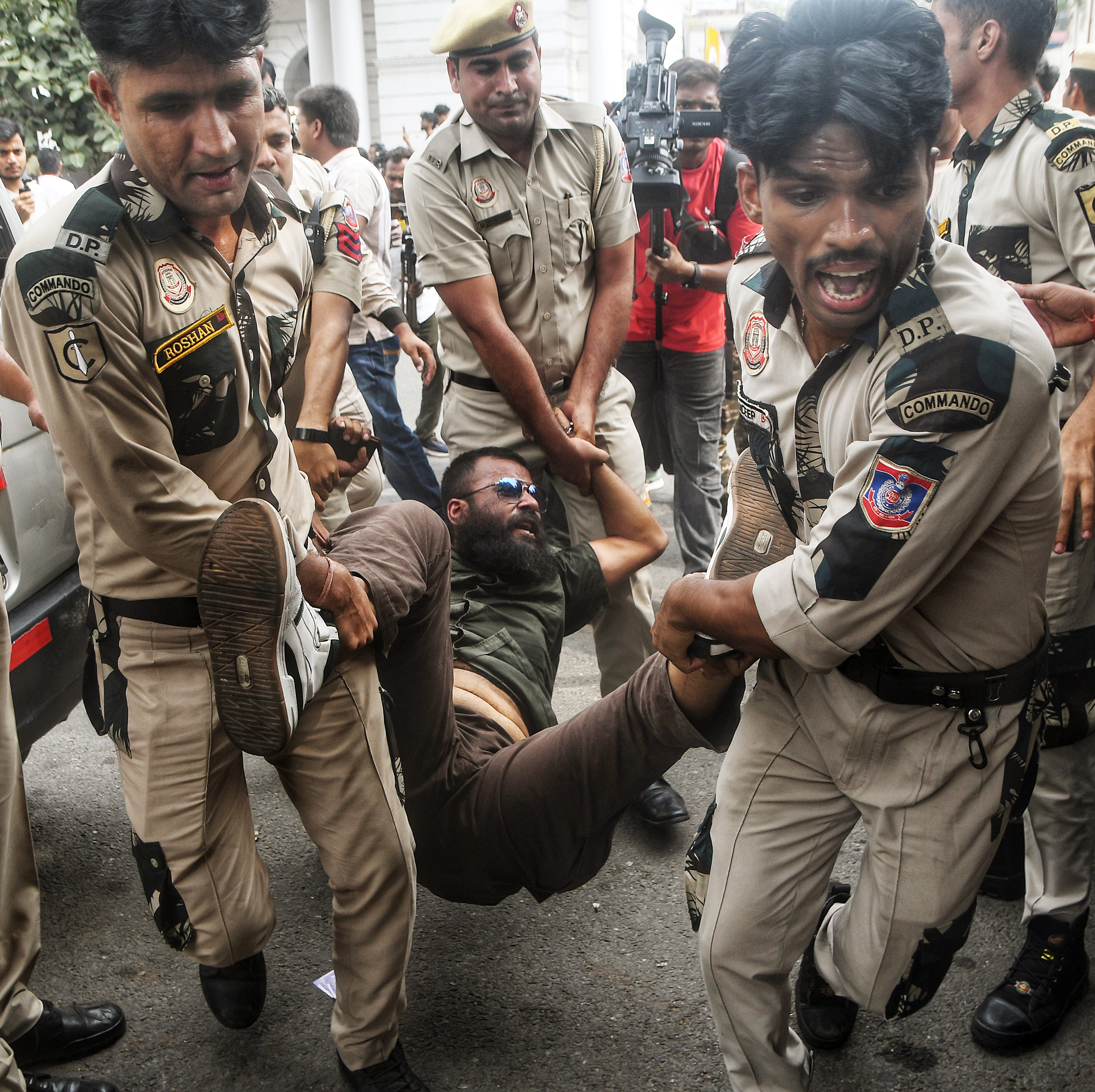 New Delhi, Oct 11 (ANI): Workers of SFI, AISF and AIYF are being detained by Delhi Police while holding a protest against CEC Gyanesh Kumar at the Inner Circle of Connaught Place, in New Delhi on Sunday. (ANI Photo) (Amit Shukla) New Delhi, Oct 11 (ANI): Workers of SFI, AISF and AIYF are being detained by Delhi Police while holding a protest against CEC Gyanesh Kumar at the Inner Circle of Connaught Place, in New Delhi on Sunday. (ANI Photo) (Amit Shukla)