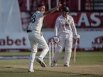 Australia's Josh Hazlewood celebrates the dismissal of South Africa's David Bedingham (R) on day four of the first Test match between South Africa and Australia Australia's Josh Hazlewood celebrates the dismissal of South Africa's David Bedingham (R) on day four of the first Test match between South Africa and Australia
