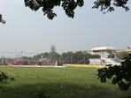 Every year at this time, the maidan hosts both Ramlila and a mela at night. This Tuesday afternoon, a Ferris wheel rises behind red cloth enclosures. (HT Photo)