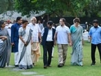  Lok Sabha LoP Rahul Gandhi with party leader Priyanka Gandhi Vadra, Telangana CM Revanth Reddy, JMM leader Mahua Majhi, NCP (SP) leader Supriya Sule and others during a high tea organised for the INDIA bloc leaders at his residence, to discuss the strategy for joint protests against Chief Election Commissioner Gyanesh Kumar's resignation.(AICC)