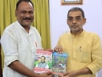 Ram Pukar Sinha (left) with RLM chief Upendra Kushwaha (HT Photo)