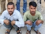 The two suspects in police custody on Monday. (HT Photo)