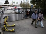 People walk past Yandex electric scooters in Moscow, Russia, October 11, 2026. REUTERS/Anastasia Barashkova