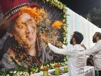 All Assam Students’ Union chief Advisor Samujjal Kumar Bhattacharya and AASU President Utpal Sarma pay floral tribute to a portrait of late singer Zubeen Garg on his first death anniversary at Latashil Playground, in Guwahati on Saturday.(ANI)