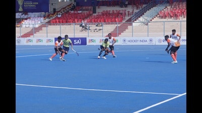 Players in action during a league match in Jhansi on Tuesday. (SOURCED) Players in action during a league match in Jhansi on Tuesday. (SOURCED)