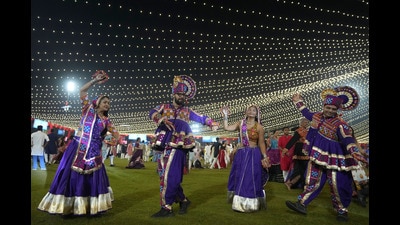 Ticket prices at organised garba events in Ahmedabad range from around  ₹1,000 to  ₹10,000, depending on the venue, date and facilities. (AP Photo)