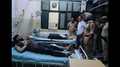 Two miscreants injured in police encounter in civil hospital on Tuesday. (Sant Arora/HT) Two miscreants injured in police encounter in civil hospital on Tuesday. (Sant Arora/HT)