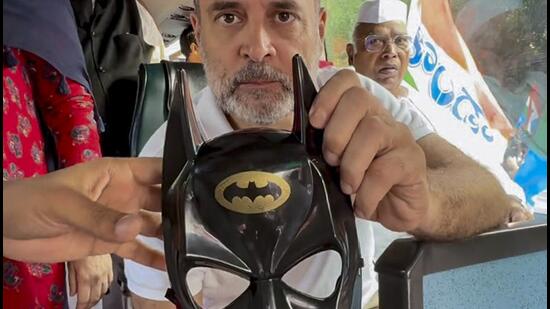 Congress chief Kharge also wore a batman mask to support the students. (@nsui/PTI)