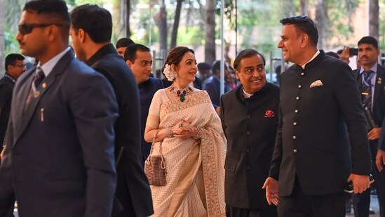 Mukesh Ambani and Nita Ambani at an event at the Jio World Convention Centre in Mumbai.