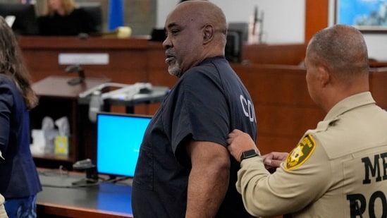 Duane Davis is escorted by police from a sentencing hearing after his murder conviction in the death of rapper Tupac Shakur on Tuesday, Oct. 13, 2026, in Las Vegas, Nevada, US.     John Locher/Pool via REUTERS     TPX IMAGES OF THE DAY