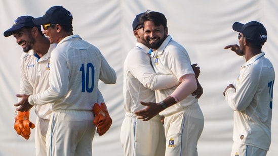 Bengal's Mukesh Kumar celebrates after taking the wicket of Delhi's Ayush Doseja during the Ranji Trophy Elite Group C cricket match between Delhi and Bengal, in Kalyani, West Bengal (PTI)