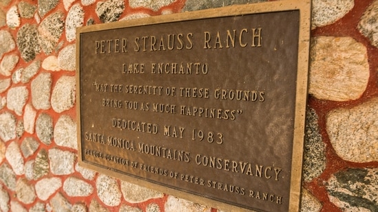Peter Strauss Ranch evolved from automotive engineer Harry Miller’s private retreat into the Lake Enchanto amusement destination, then returned to residential use under actor Peter Strauss. Now part of the Santa Monica Mountains National Recreation Area, its historic structures and natural setting host visitors and cultural events. (Wikimedia Commons)