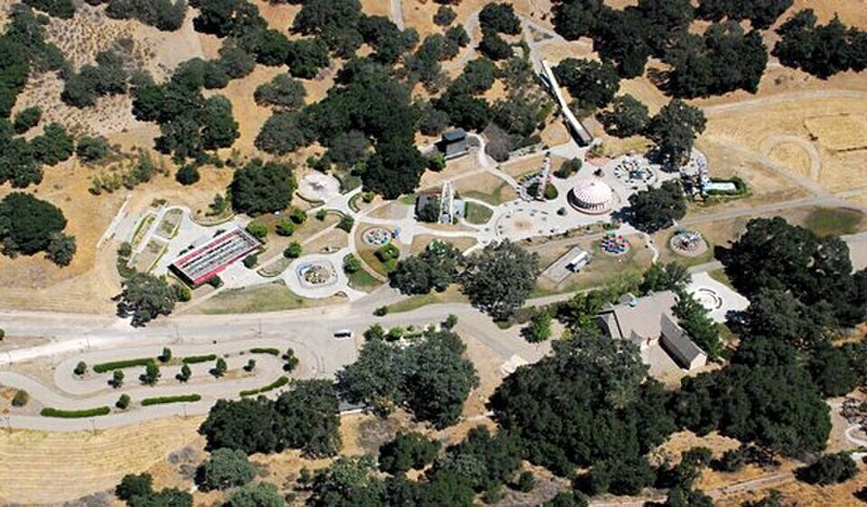 An aerial photo shows the amusement park area of Neverland Ranch, one of the developed parts Jackson offered to remove from the farmland program. (Wikimedia Commons)