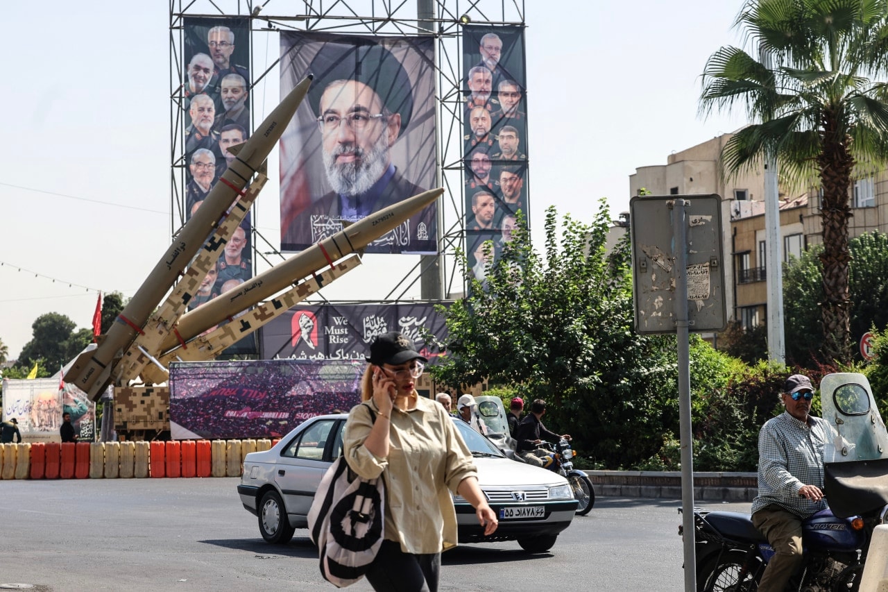 Iranian-made missiles stand beside a portrait of supreme leader Mojtaba Khamenei in Tehran. Iranian-made missiles stand beside a portrait of supreme leader Mojtaba Khamenei in Tehran.