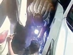 A CCTV grab of the accused stealing the tyres of Monday night. (HT)