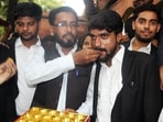 Advocates celebrate after the district court sentenced Muskan Rastogi and Sahil Shukla to death for the murder of merchant navy officer, Saurabh Rajput. 