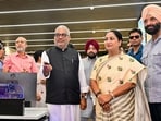 Delhi Chief Minister Rekha Gupta looks on as Union Environment, Forest and Climate Change Minister Bhupender Yadav virtually inaugurates 13 new Continuous Ambient Air Quality Monitoring Stations (CAAQMS), at Delhi Pollution Control Committee's (DPCC) Integrated Command and Control Centre (ICCC). (@byadavbjp/X via PTI Photo)