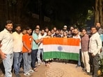 Cockroach Janta Party (CJP) founder Abhijeet Dipke along with party activists pose with the national tricolour following their release after being detained by Delhi Police near Jantar Mantar.