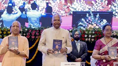 Chief minister Yogi Adityanath, along with former President Ram Nath Kovind and his wife, launch the Hindi edition of former President’s autobiography ‘Bharatiya Ganarajya Ki Vijay Gatha: Mera Jeevan, Mera Sangharsh’ (Triumph of the Indian Republic: My Life, My Struggles) at Lok Bhavan, in Lucknow on Wednesday. (PTI PHOTO) Chief minister Yogi Adityanath, along with former President Ram Nath Kovind and his wife, launch the Hindi edition of former President’s autobiography ‘Bharatiya Ganarajya Ki Vijay Gatha: Mera Jeevan, Mera Sangharsh’ (Triumph of the Indian Republic: My Life, My Struggles) at Lok Bhavan, in Lucknow on Wednesday. (PTI PHOTO)