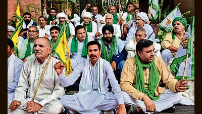 Farmers staging a protest at the new grain market in Karnal on Wednesday. (HT Photo) Farmers staging a protest at the new grain market in Karnal on Wednesday. (HT Photo)